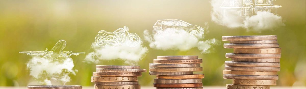 stacks of random coins with chalk drawings in clouds above them