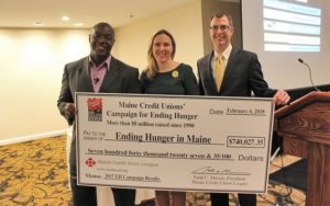 Maine Credit Union League with giant check