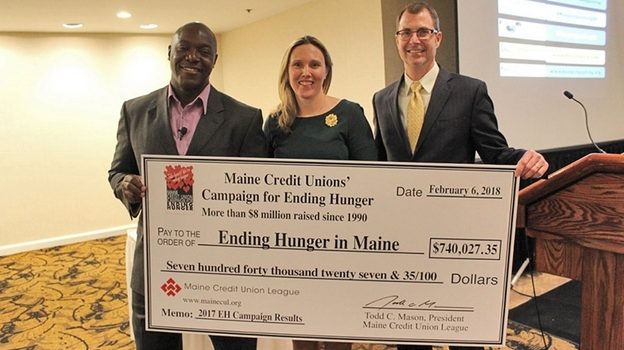 Maine Credit Union League with giant check